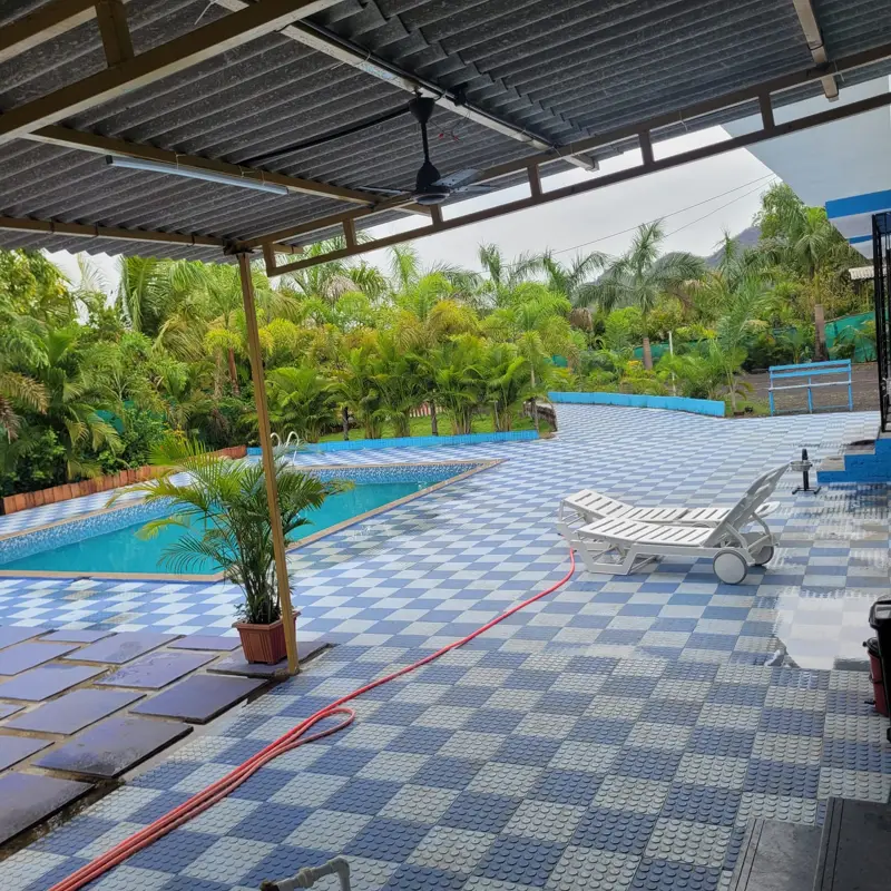 The covered terrace looking out over the pool
